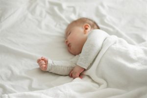 When does the baby sleep regularly?